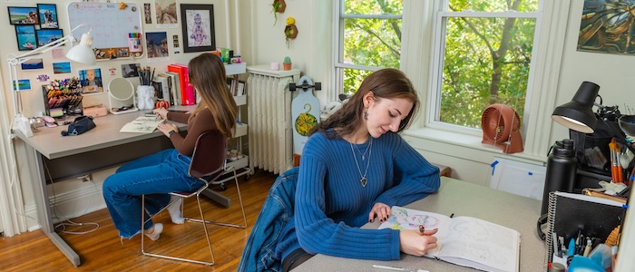 students studying in dorm