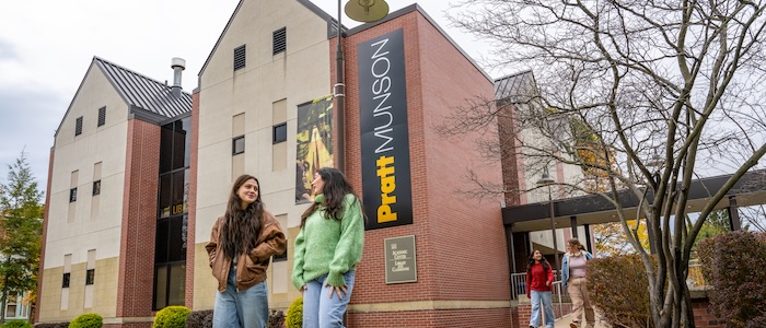 girl walking around pratt munson 