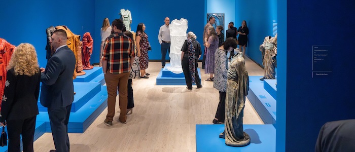 visitors at munson museum of art in gallery