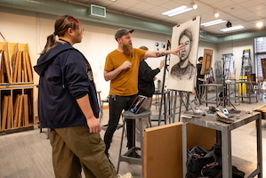 teacher instructing student