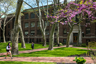 students walking through pratt campus courtyard