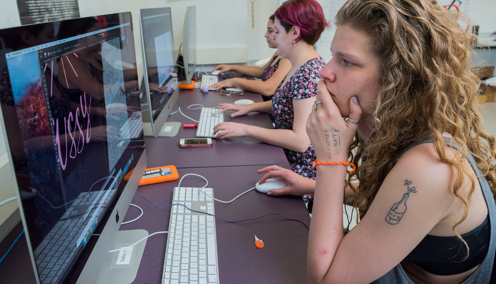 students working on computer